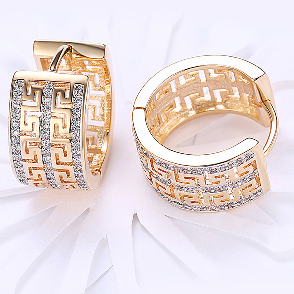 French Twist Design Huggie Earring in Goldtone with Crystals