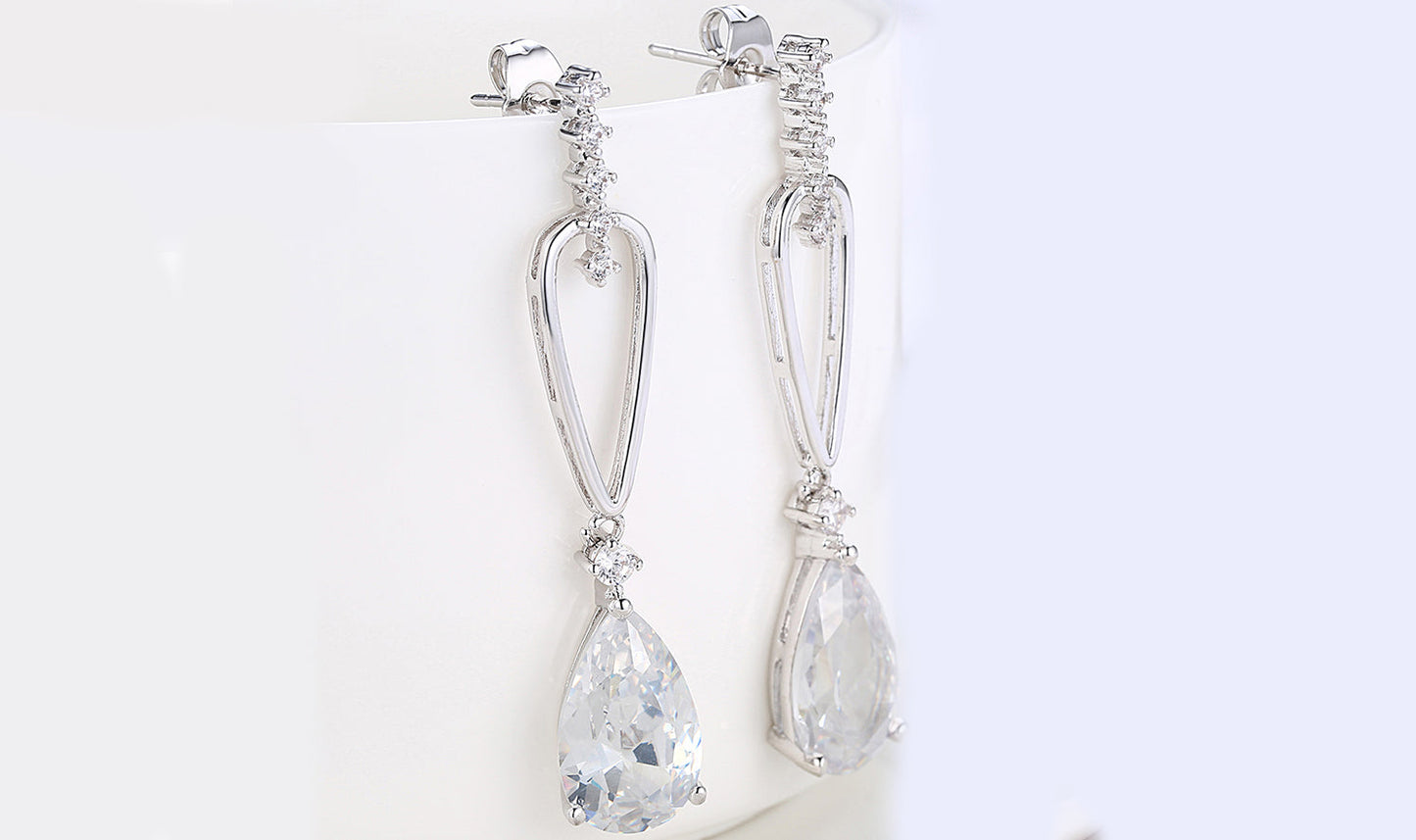 14K White Gold Tone Dangling White Sapphire Pear Cut Earrings