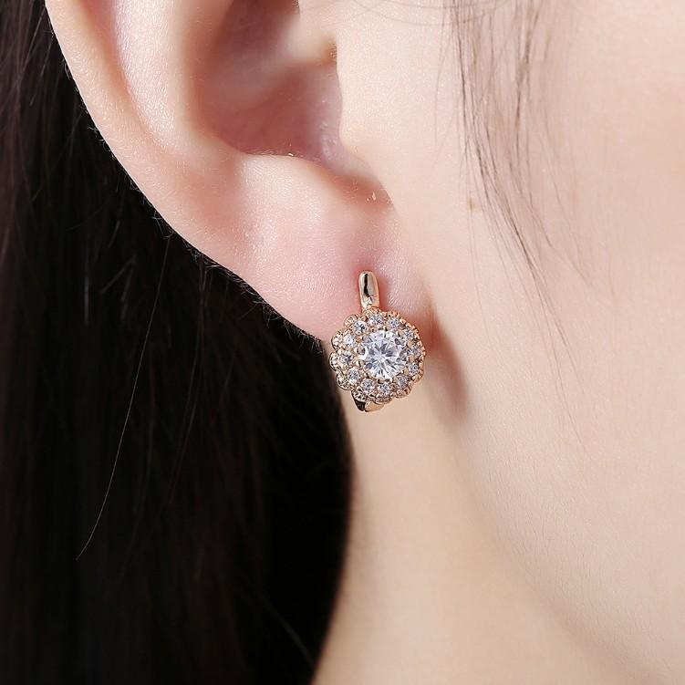 Swarovski Crystal Micro Pav'e Bursting Star Leverback Earrings Set in Goldtone - Riakoob Jewelry www.goldennycjewelry.com fashion jewelry for women