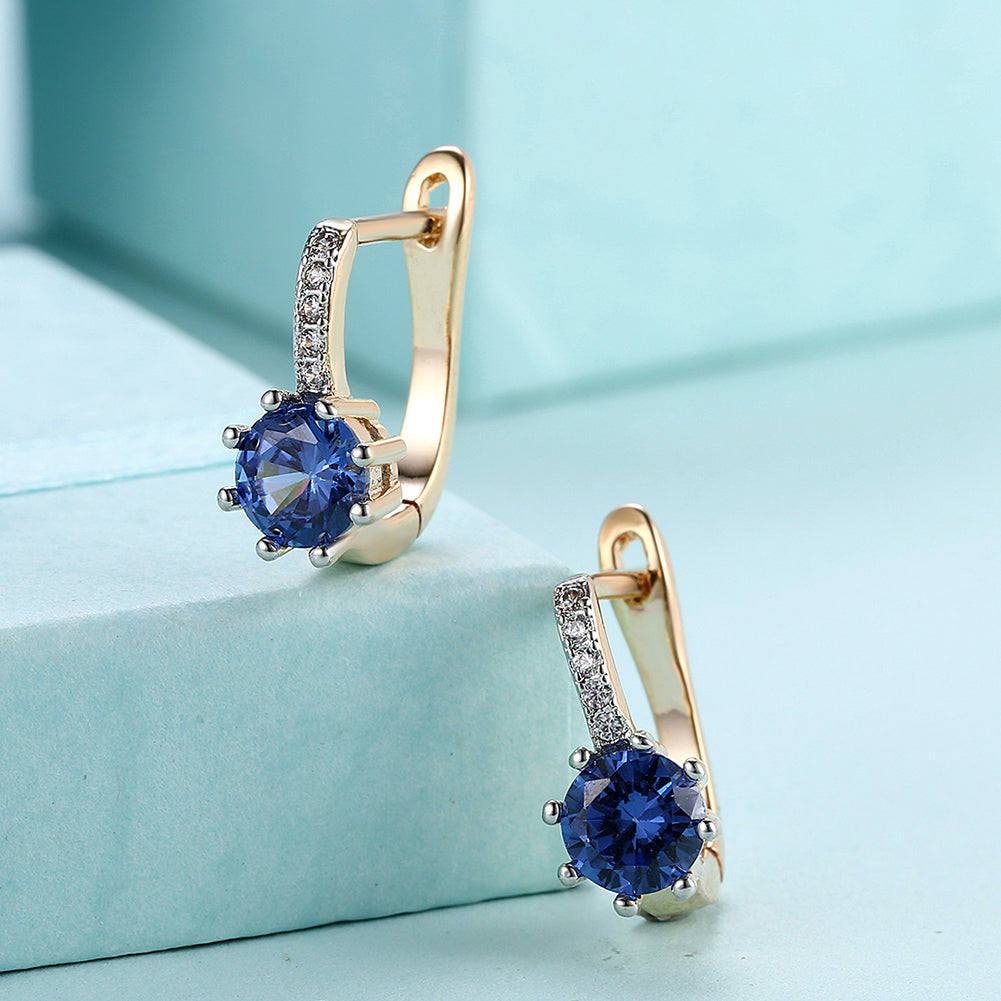 Blue Topaz 0.70 CT Round Huggie Earring in Silvertone