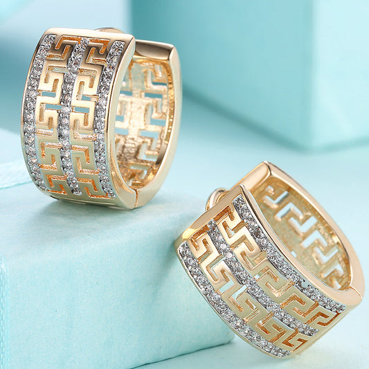 French Twist Design Huggie Earring in Goldtone with  Crystals