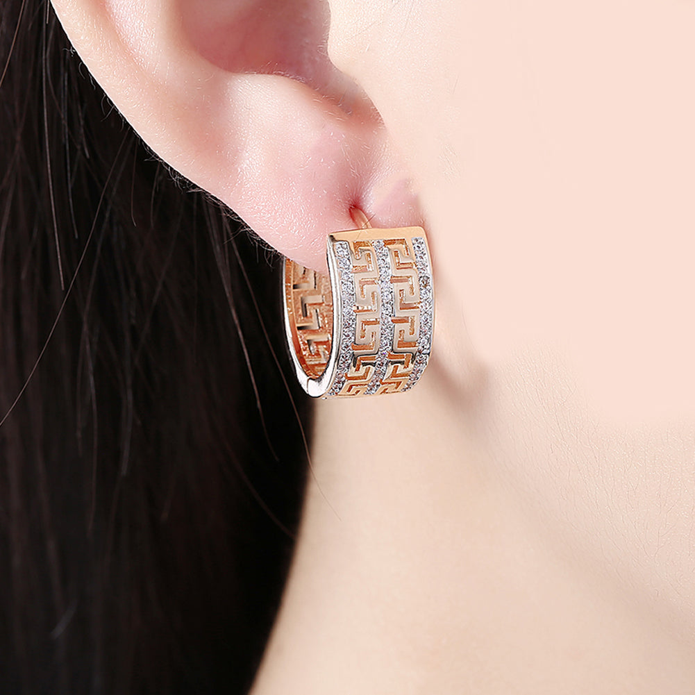 French Twist Design Huggie Earring in Goldtone with  Crystals