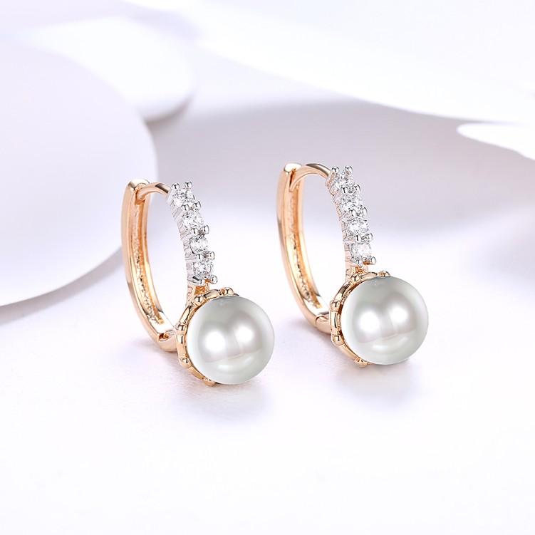 Swarovski Crystal Curved Pav'e Pearl Huggie Earrings Set in Goldtone - Riakoob Jewelry www.goldennycjewelry.com fashion jewelry for women