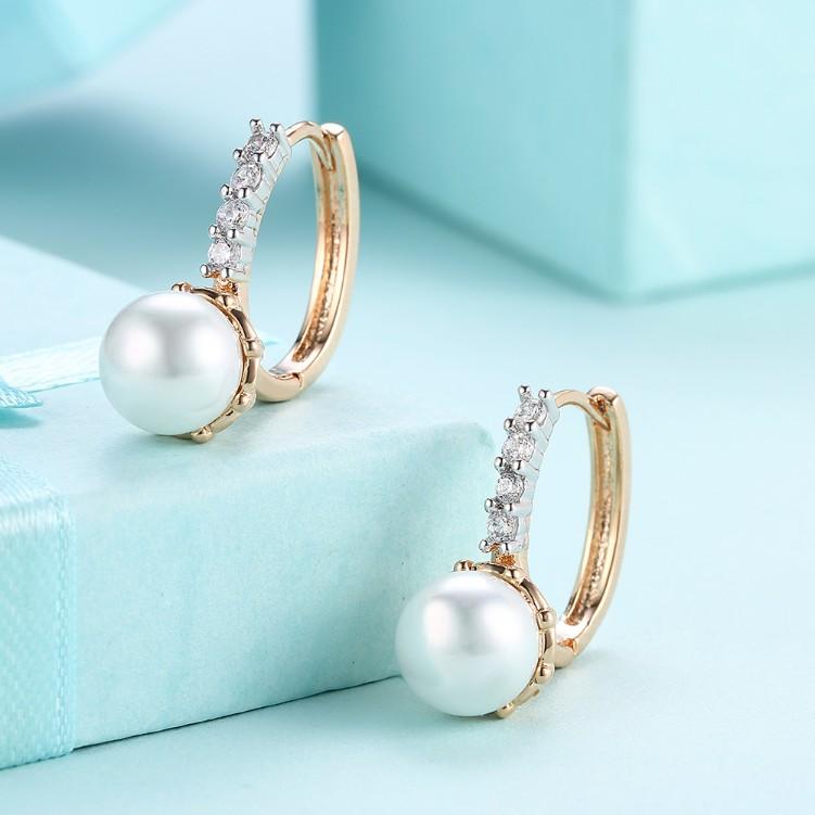 Swarovski Crystal Curved Pav'e Pearl Huggie Earrings Set in Goldtone - Riakoob Jewelry www.goldennycjewelry.com fashion jewelry for women