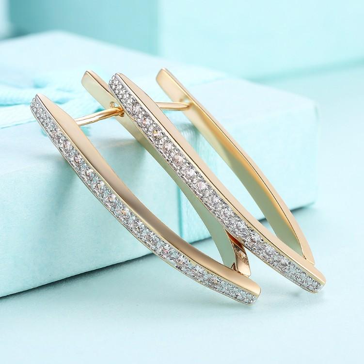 Swarovski Crystal Micro-Pav'e Curved Huggie Earrings Set in Goldtone - Riakoob Jewelry www.goldennycjewelry.com fashion jewelry for women