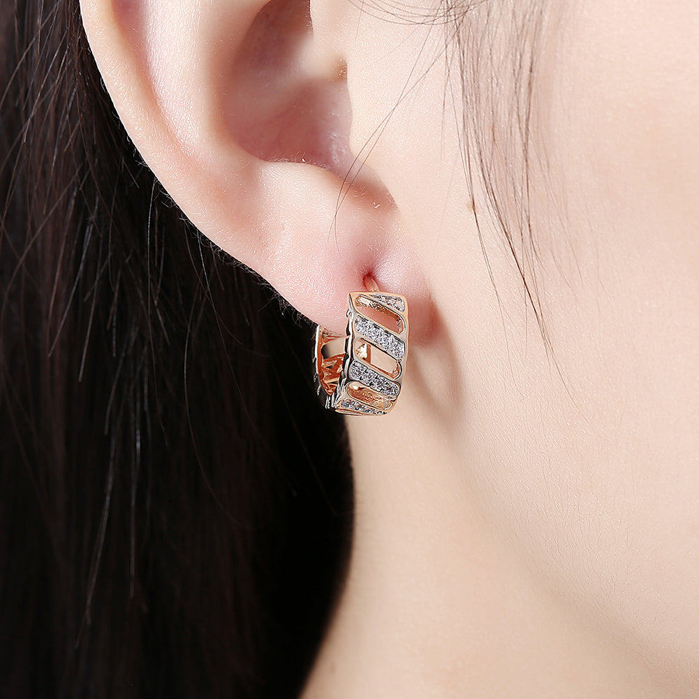 Diamond Cut Opening Huggie Earring in Goldtone