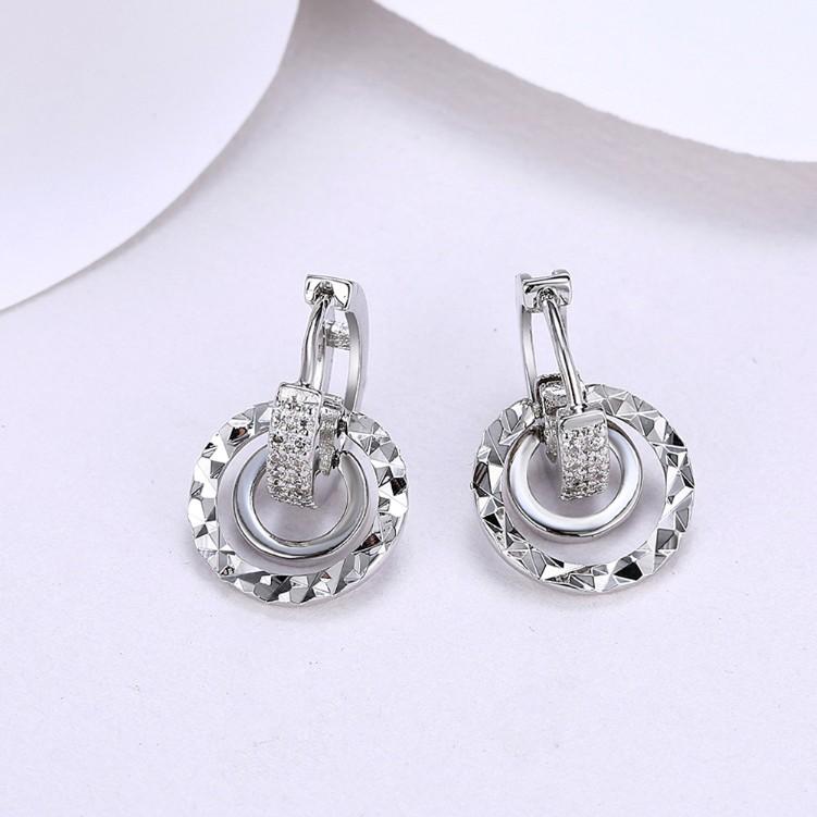 Swarovski Crystal Hammered Design Circular Earrings Set in Silvertone - Riakoob Jewelry www.goldennycjewelry.com fashion jewelry for women