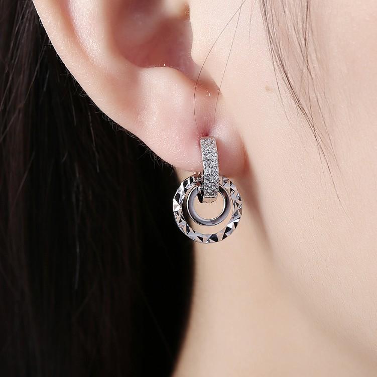 Swarovski Crystal Hammered Design Circular Earrings Set in Silvertone - Riakoob Jewelry www.goldennycjewelry.com fashion jewelry for women