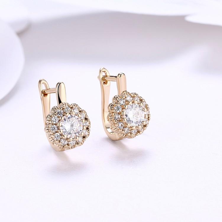Swarovski Crystal Micro Pav'e Bursting Star Leverback Earrings Set in Goldtone - Riakoob Jewelry www.goldennycjewelry.com fashion jewelry for women