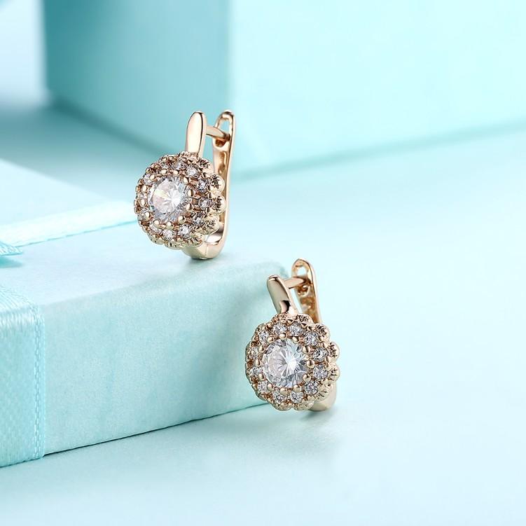 Swarovski Crystal Micro Pav'e Bursting Star Leverback Earrings Set in Goldtone - Riakoob Jewelry www.goldennycjewelry.com fashion jewelry for women
