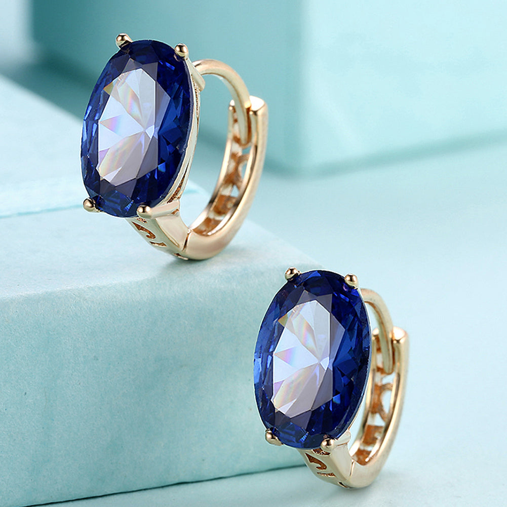 1.00 Ct Sapphire Oval Cut Huggie Earring in Goldtone
