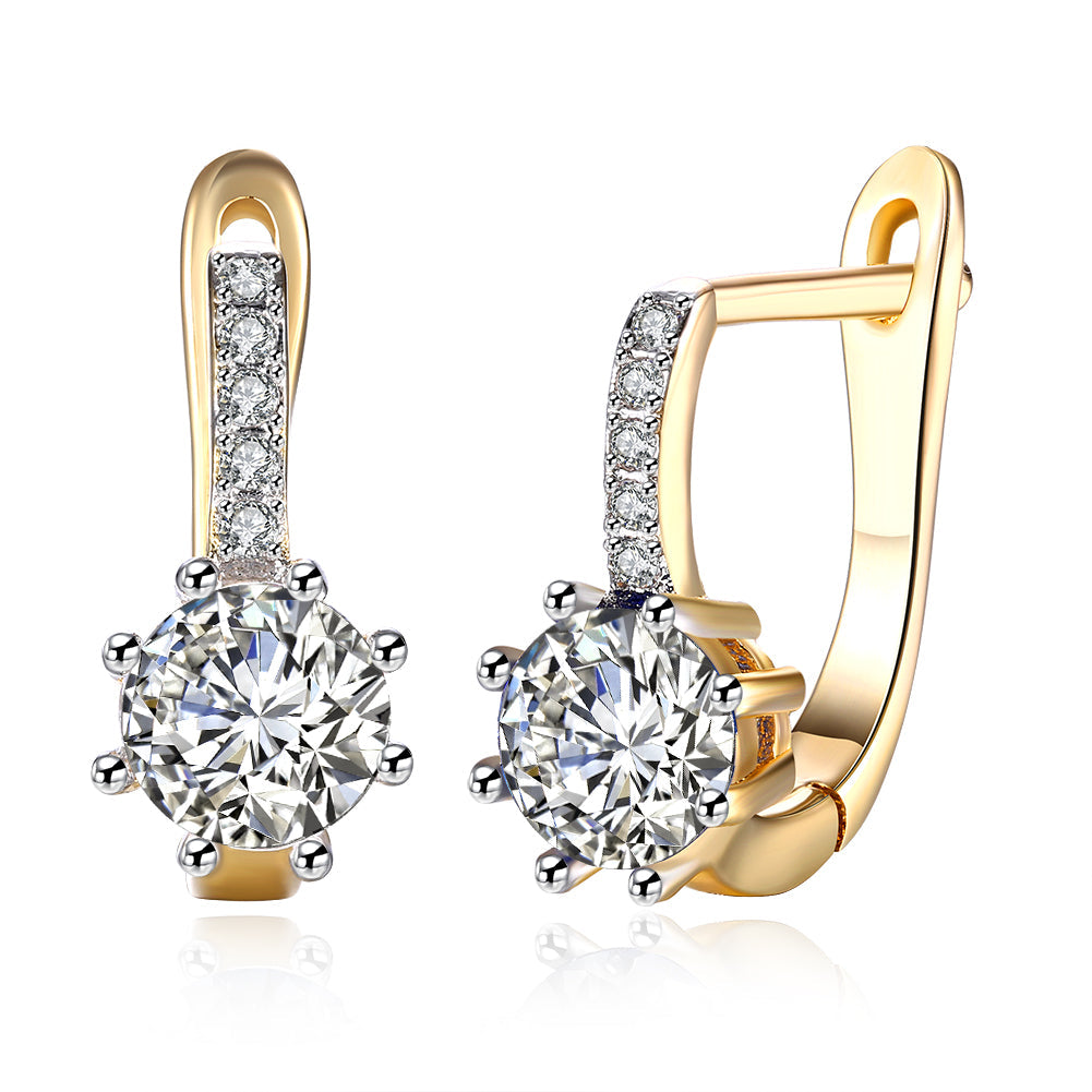 White Topaz 0.70 CT Round Huggie Earring in  Silvertone
