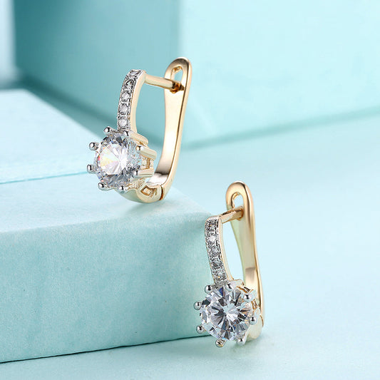 White Topaz 0.70 CT Round Huggie Earring in  Silvertone