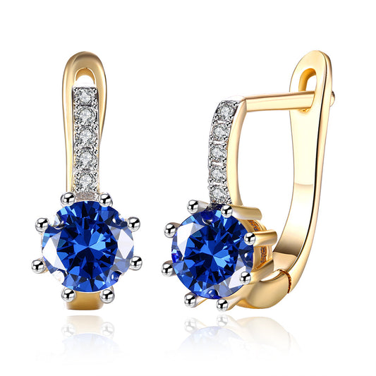 Blue Topaz 0.70 CT Round Huggie Earring in  Silvertone
