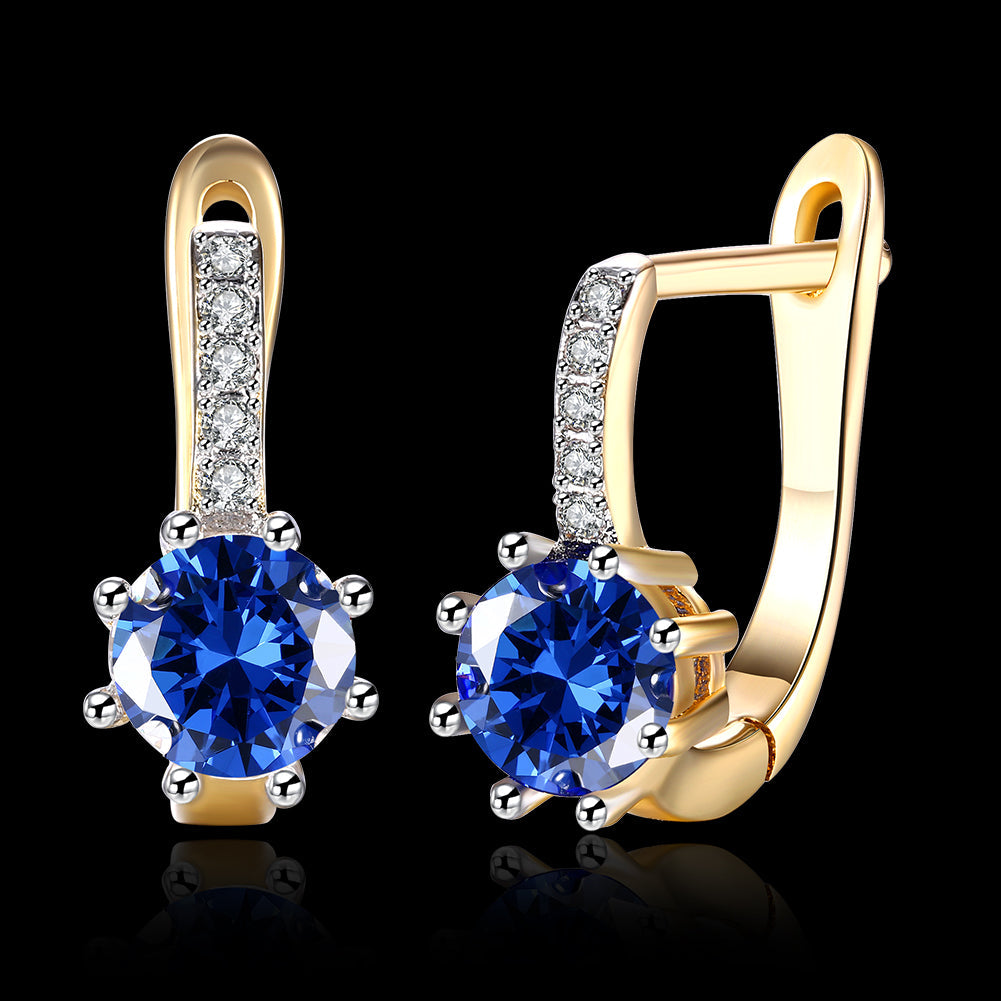 Blue Topaz 0.70 CT Round Huggie Earring in  Silvertone