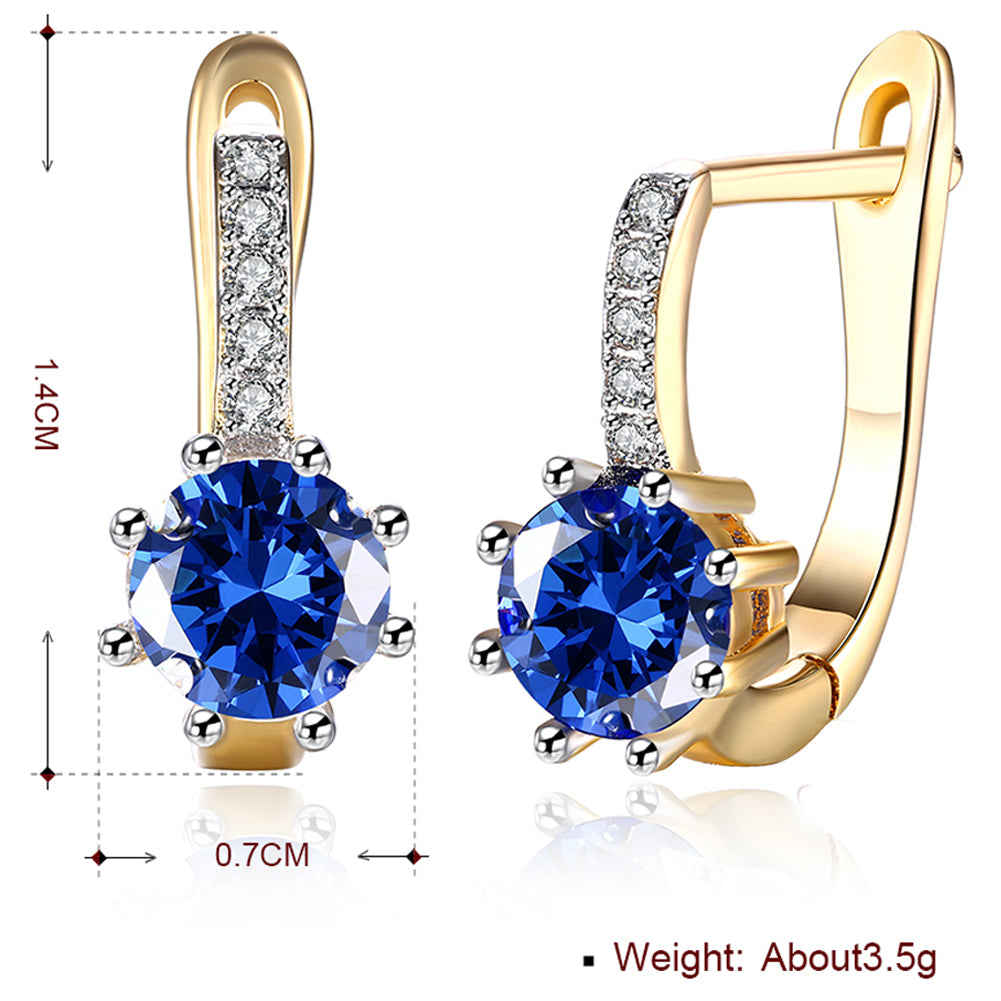 Blue Topaz 0.70 CT Round Huggie Earring in  Silvertone