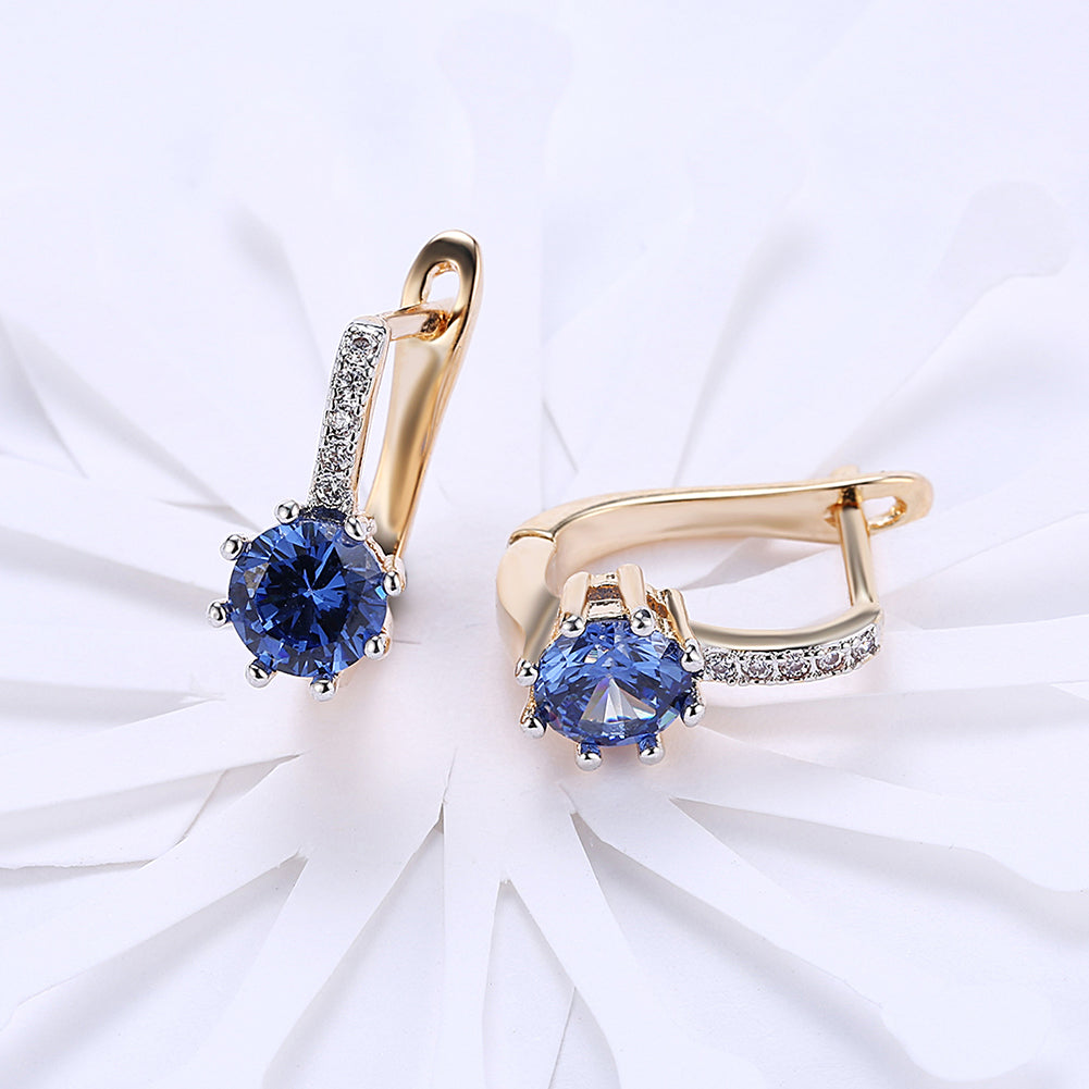 Blue Topaz 0.70 CT Round Huggie Earring in  Silvertone
