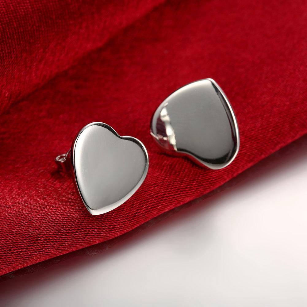 Smooth Heart Stud Earring in  Silvertone