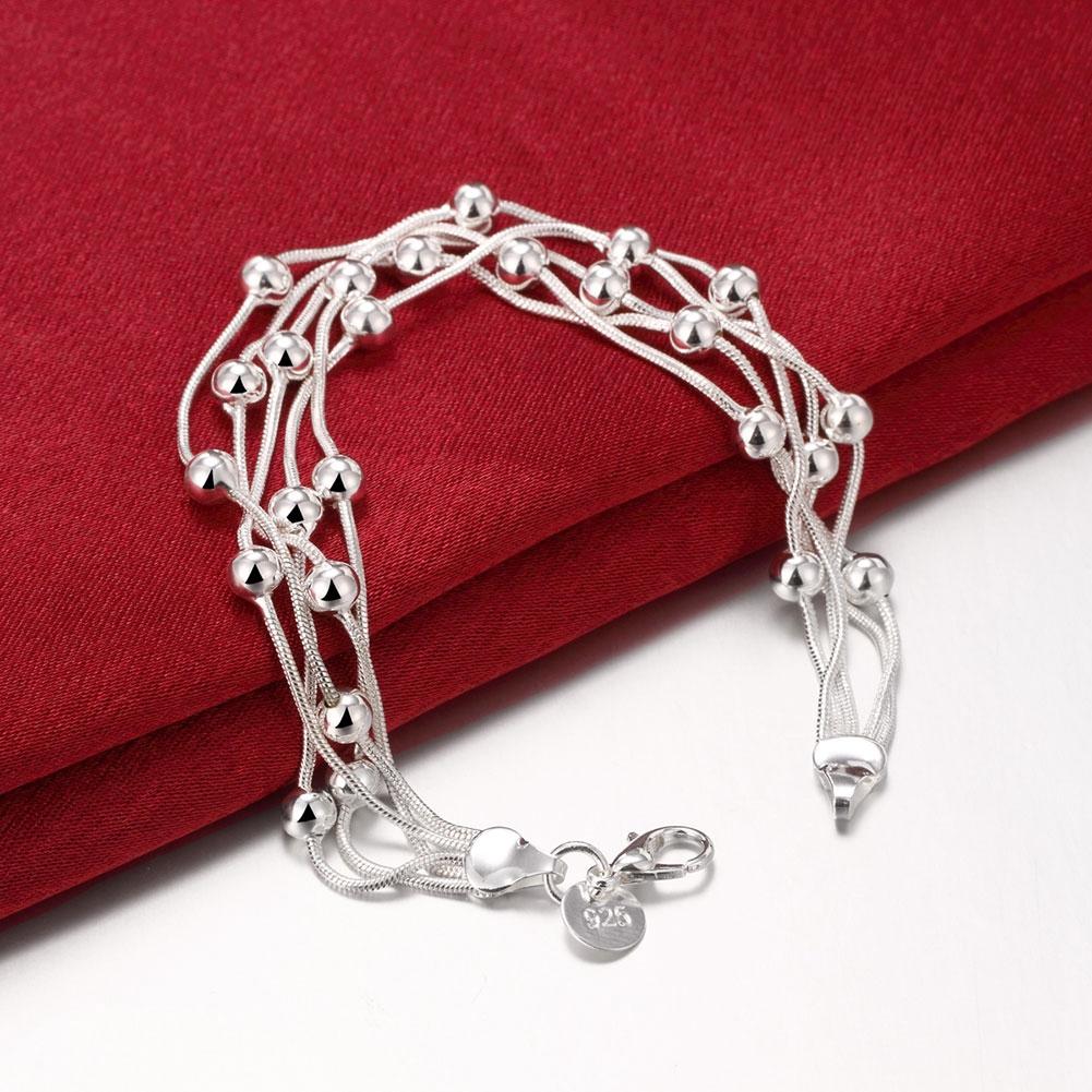 Silvertone Orchid Pearls Dangling Strands Bracelet