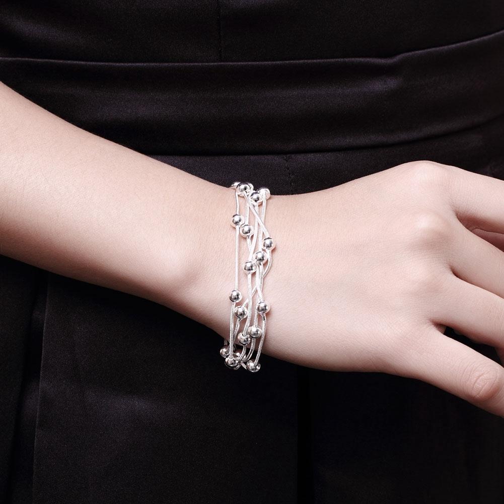 Silvertone Orchid Pearls Dangling Strands Bracelet